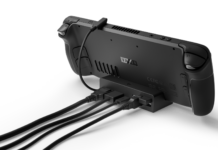 Best Handheld Gaming Accessories 2026: Cases, Docks, Power Banks, and the Cable That Saves You Steam Deck handheld in its docking station, representing handheld gaming accessories